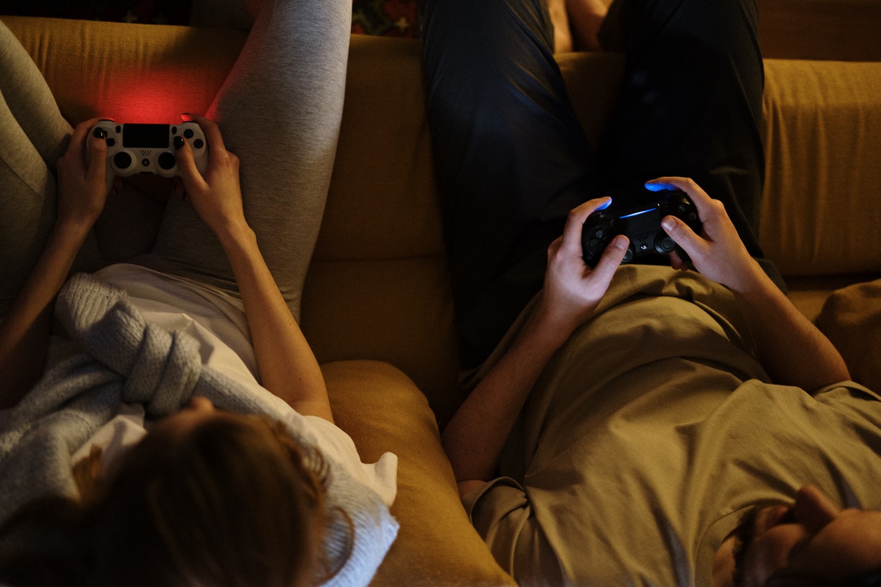 couple playing gaming console